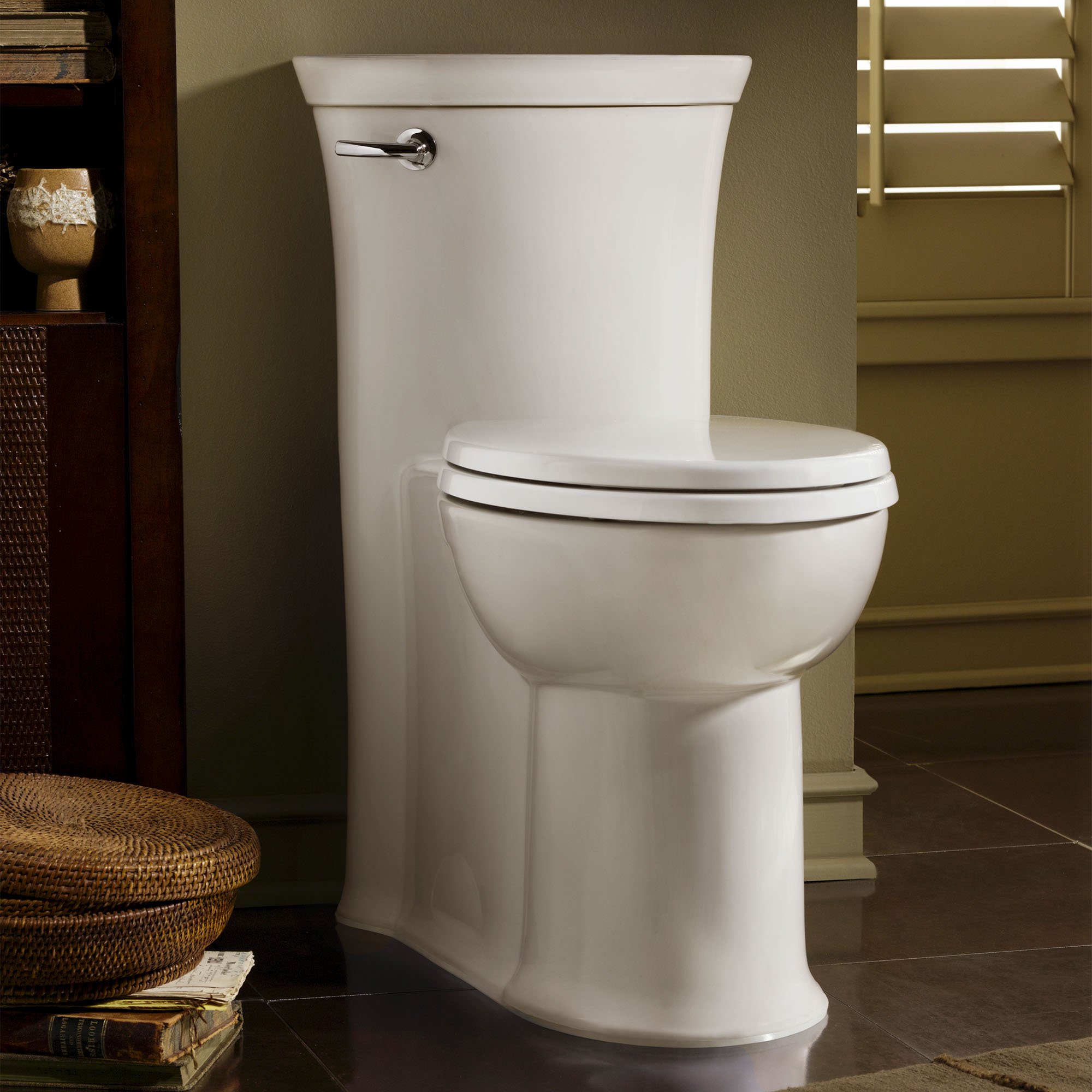 Tropic® One-Piece 1.28 gpf/4.8 Lpf Chair Height Elongated Toilet With Seat